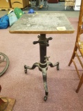 Industrial adjustable table base on casters