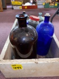 Wood crate and old bottles