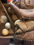 Baseball gloves and balls