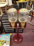 Double gum ball machine on pedestal base, plastic tops