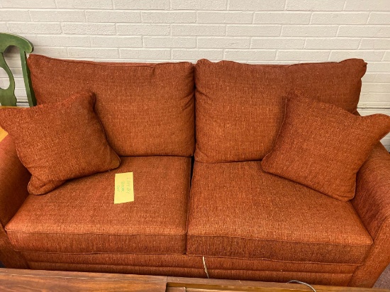 Very nice red rust colored sleeper sofa