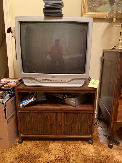 JVC TV, TV stand, VHS tapes, DVD VCR player
