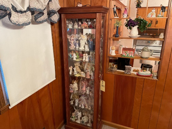 Lighted curio cabinet with sliding door
