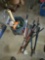 Tool bucket, ratchet straps, levels, limb loppers, machete, rakes