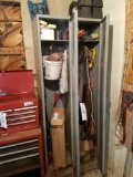 2 door locker and contents, saws, weed whip string, wire