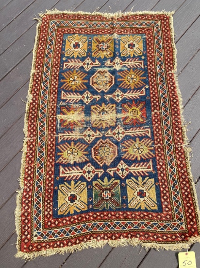 Persian rug, shows wear & has hole, 4.11 x 3