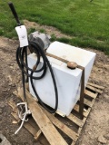 Proximately 50 gallon steel fuel tank with hand pump.