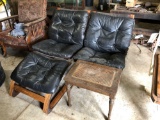 (2) leather cushioned chairs