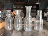 (7) milk bottles