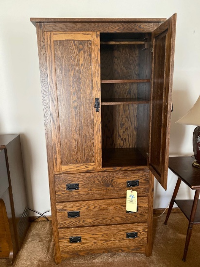 Oak storage/TV cabinet, 72" tall x 34" wide.