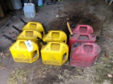 (5) diesel cans, (3) gas cans