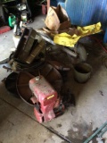 Wheelbarrow, bolt stock, valve cover and engine