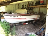 Larson Lapline boat with 60HP outboard and trailer.