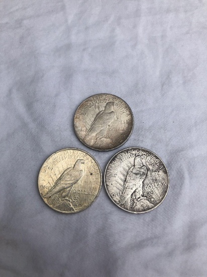 3 Peace silver dollars. All 1922