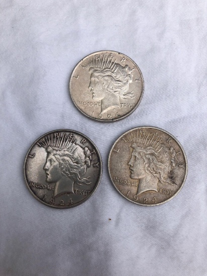 3 Peace silver dollars. All 1924