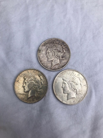 3 Peace silver dollars. All 1923