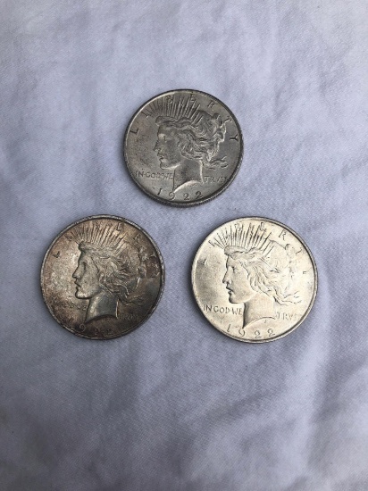 3 Peace silver dollars. All 1922