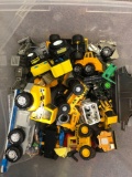 Tote of diecast vehicles, tractor