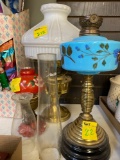 Lot of oil lamps and shades