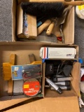 2 flats tools, tape, new scrapers, batteries, etc