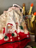 Noma electric Christmas candles (6) and Santa Claus apron