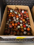 Multicolored marbles, reds, blues