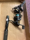 2 fishing reels, cardinal and daiwa