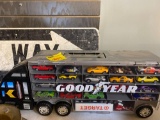 Goodyear truck filled with diecast cars