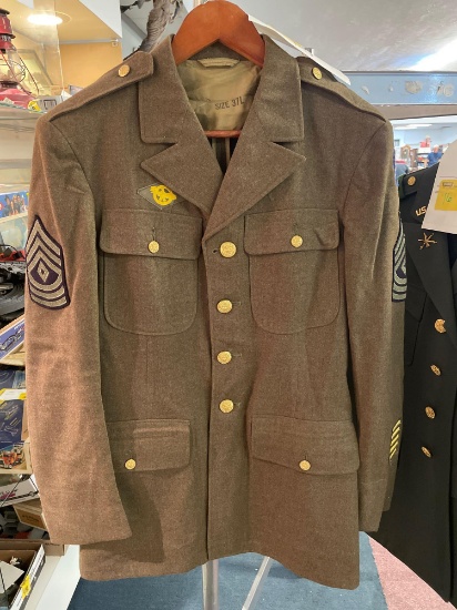 Vintage military jacket with patches and buttons