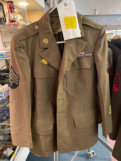 Vintage military jacket with pins and patches