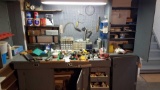 Contents of work bench, tools, saws, organizers and motor