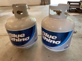 (2) Blue Rhino propane tanks.