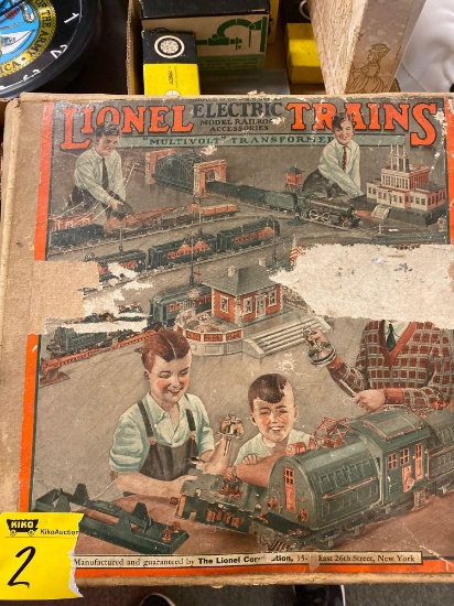 Antique Lionel train in original box, transformer, bridge, light posts, extra tracks
