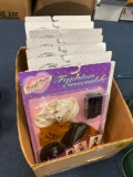 One box of new doll clothes, bigger than Barbie size