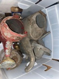 Galvanized watering cans, old heater, lunch box, CB radios, wheel, etc