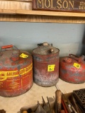 Three vintage gas cans