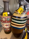 Two unmarked tall vases