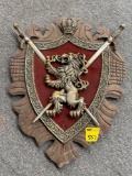 Wooden wall plaque with lion sword crest
