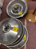 Six car wheel hubcaps