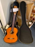Suzuki guitar in case