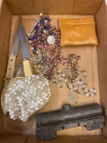 Vintage pens, rosaries, metal or cast iron train, beaded purse