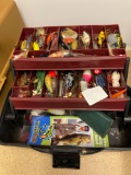 Two fishing tackle boxes with lures