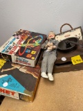 Peewee Herman doll, basketball game, Mickey Mouse roller coaster game, coffee grinder, etc.