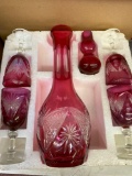 Pink glass vase or pitcher and glasses