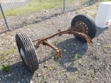 Axle with wheels