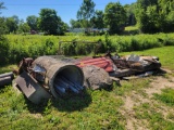 Posts, old corrugated roofing, metal stakes and posts, scrap metal