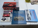 Mustang books, model car, Remington tin sign, cookie jar, misc. headlights and parts