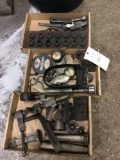 Three boxes of assorted hardware and tooling.
