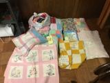 Assorted quilts and material