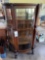 Oak curved glass curio cabinet